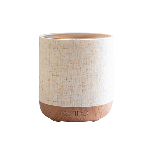 Essential oil diffuser with night light and fabric cover material